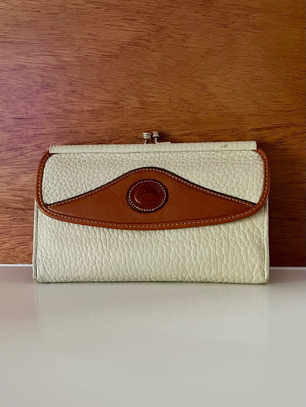 Vintage Dooney & Bourke bone pebbled leather wallet with tan trim